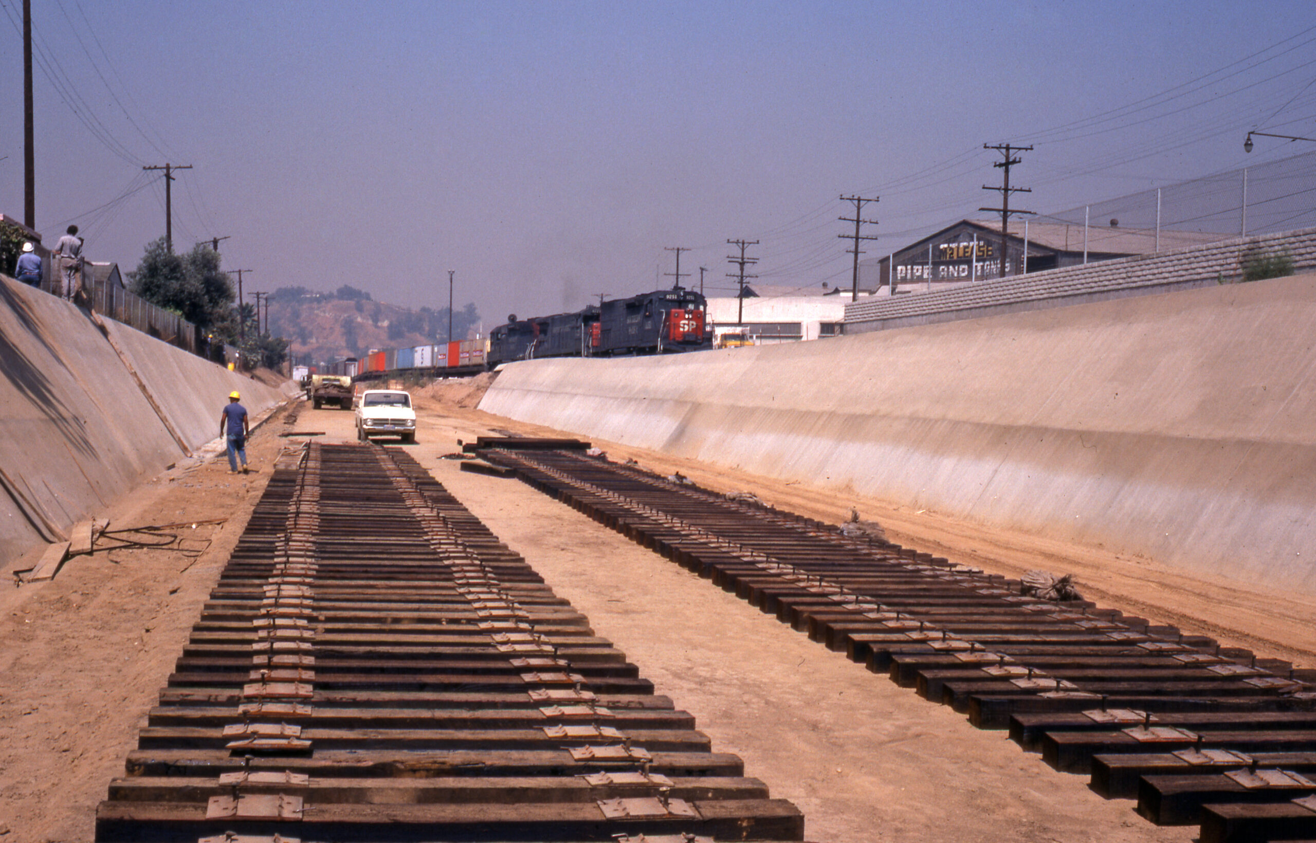 Track construction at Alhambra, California on July 21, 1978. Shown in the upper right of the photo is the LAEST, with SP 9251 on the head end. Photo by Mike McGinley.